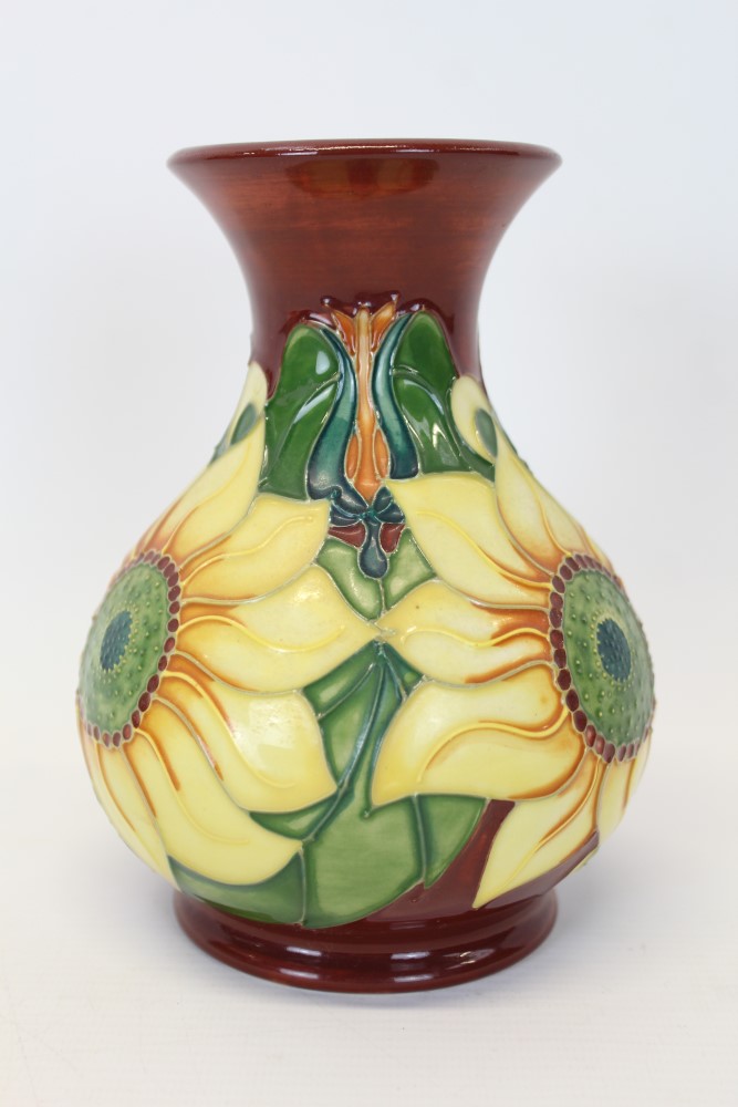 Moorcroft Pottery vase decorated in the Inca Gold Sunflower pattern,