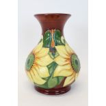 Moorcroft Pottery vase decorated in the Inca Gold Sunflower pattern,