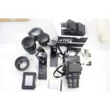 Bronica ETR si camera with three lenses - 50mm, 75mm and 150mm,