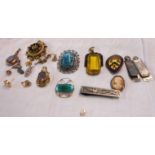 A small collection of jewellery items including a 9ct. gold and enamelled panel brooch, 1920's