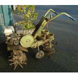 A Honda GX160 rotavator with homemade conversion to weed puller