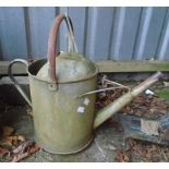 A vintage two gallon galvanised watering can