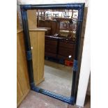 A blue painted wood framed and woven leather clad bevelled oblong wall mirror - 4' X 27 1/2"