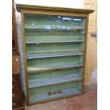 A 4' 8" late 19th Century wood grained and glazed book cabinet with moulded cornice and six