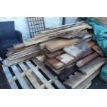 A large quantity of sawn mixed hardwood and other planks and beams, some with bark on