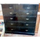 A 4' 6" late Victorian ebonised chest of two short and four long graduated drawers, set on squat bun
