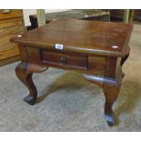 A 24" solid eastern polished hardwood tea table with single frieze drawer, set on heavy cabriole