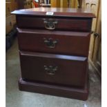 A pair of 19" mahogany effect bedside chests with glass inset top drawer and two long graduated