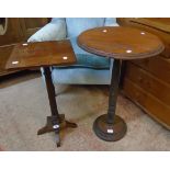 Two mixed wood pedestal tables, one with circular top, the other with turned and fluted pillar