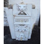 A Victorian carved sandstone key stone with lion mask to top and acanthus scroll bracketed text
