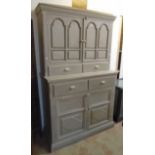 A 3' 11" continental painted pine dresser with pair of arched panel doors and two short drawers,