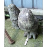 Two garden concrete owl figures