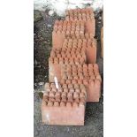 Thirty old terracotta scallop pattern edging tiles