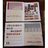 A stock album containing mainly mint GB decimal stamp packs, some used world commemoratives and