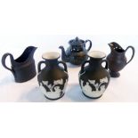 A Wedgwood basalt jug - sold with another jug, teapot and a pair of Jasperware two handled