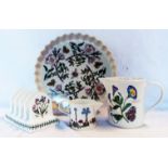 Four pieces of Portmeirion Botanic Garden pattern ware, comprising flan dish, toast rack and two