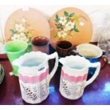 Five assorted jugs, a Watcombe terracotta vase and two terracotta plaques with apple blossom