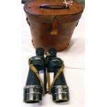 A pair of Ross military X7 binoculars with graticuled right lens, in an associated 1944 dated B.H. &