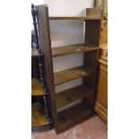 A 21" waxed and stained pine five shelf open bookcase