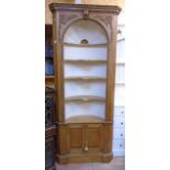 A 3' 2" waxed pine and part painted corner alcove unit in the Georgian style with acanthus and
