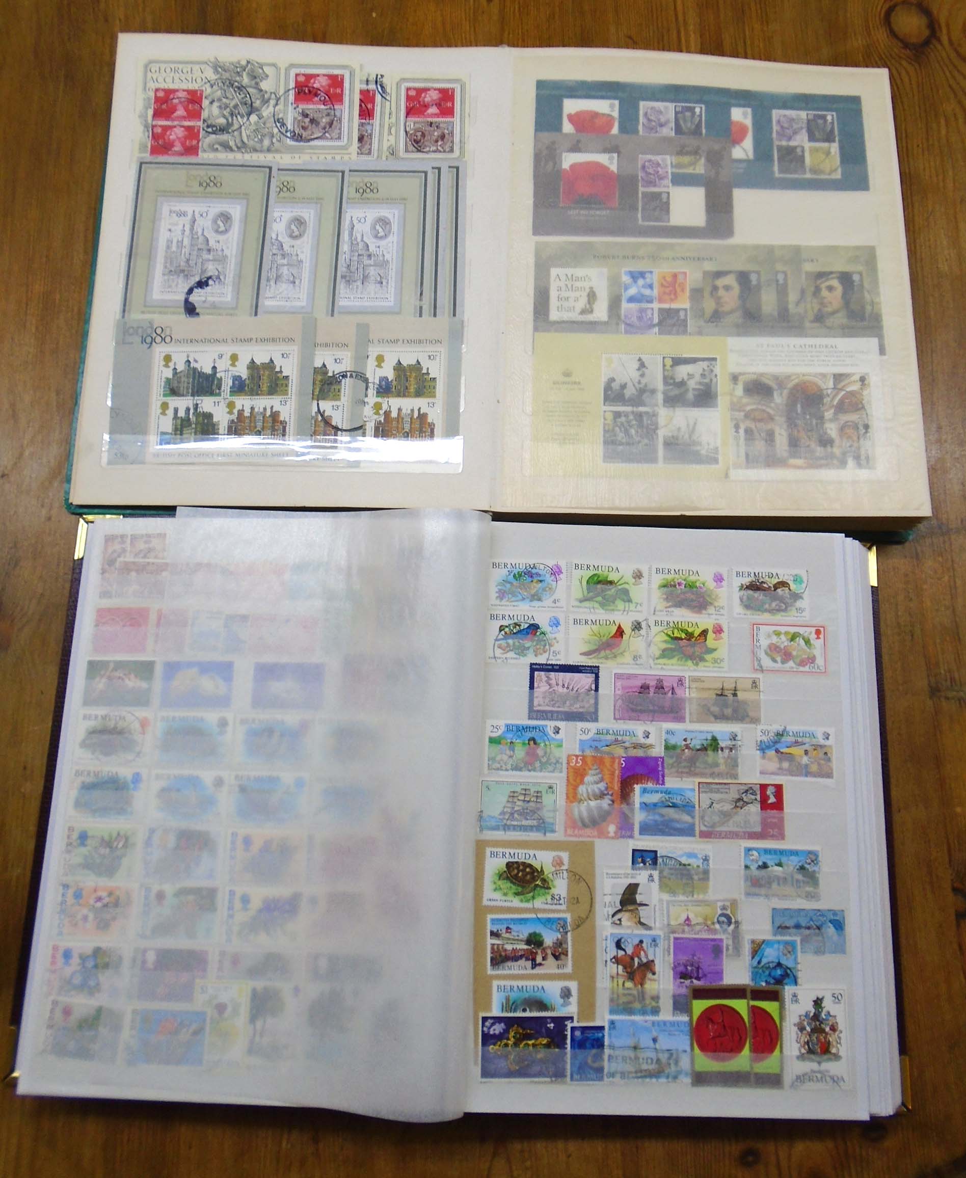 Two large stock books containing a collection of Queen Elizabeth II commemorative and other stamps