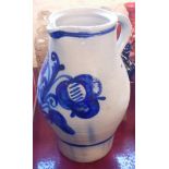 A German Westerwald stoneware blue and white pitcher - sold with two Staffordshire spaniels