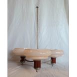 A Late Art Deco three branch centre light fitting with pale pink glass shades