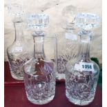 Three matching cut glass Sherry decanters - sold with a cut glass spirit decanter