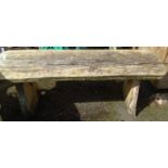 A 5' 1" rustic hardwood garden bench with standard ends