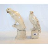 A 13" carved alabaster figure of a parrot - sold with a 12" similar figure of a raptor