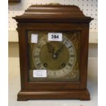 A walnut veneered bracket clock with brass and silvered dial marked for Rutherford Hawick, with