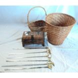 A carved jewellery box and two wicker baskets - sold with six brass handled skewers