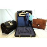 A vintage RevRobe suitcase, modern black Gladstone bag and a soft briefcase