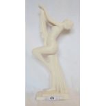 A 21" white painted ceramic statue of a nude woman