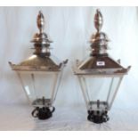 A pair of modern chrome finish street light pattern garden lights