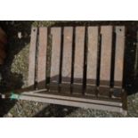 A wrought iron fire grate