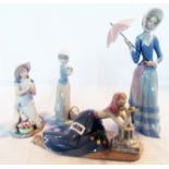 A Lladro figure of a woman with an umbrella (a/f) - sold with a Franklin Mint porcelain figure '