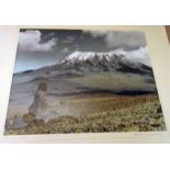 A vintage hand coloured photograph of Mount Kilimanjaro by Arthur Firmin (1912-1955)