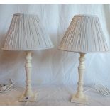 A pair of Laura Ashley painted wood column pattern bedside lamps with shades