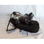 A Canon EOS 300 with soft case