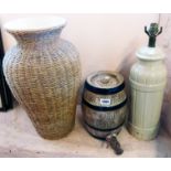 A stoneware lamp base, barrel and cane work clad vase