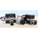 Two 1950's Russian Zorki-1 35mm cameras, both with original leather cases - sold with a KOMZ 1:4 F=