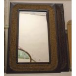 A pair of modern brown leather and woven seagrass framed oblong wall mirrors