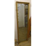 An antique gilt framed full length mirror with original plate - 4' 9" X 16"