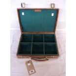 A vintage Gunmark leather clad shotgun cartridge case - to hold six boxes