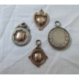 Four silver and silver gilt sporting fob medals, all named to A.H. Blackmore from the B.P.L.C. Gym