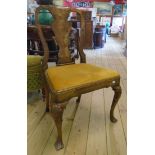 A pair of early 19th Century walnut framed Queen Anne style dining chairs with shaped scroll splat