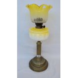 A Victorian brass table oil lamp with Corinthian column base, moulded white and yellow glass