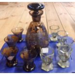 An Italian part liqueur set with silvered decoration on brown glass - sold with five faceted glass