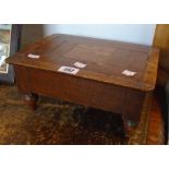 A 19th Century mixed wood parquetry topped footstool, set on turned feet